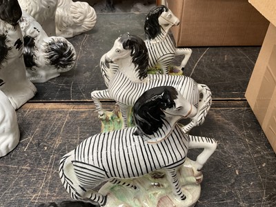 Lot 154 - Two pairs of Staffordshire zebras