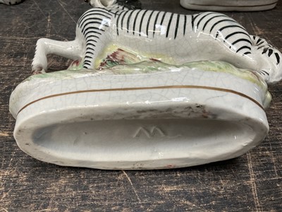 Lot 154 - Two pairs of Staffordshire zebras