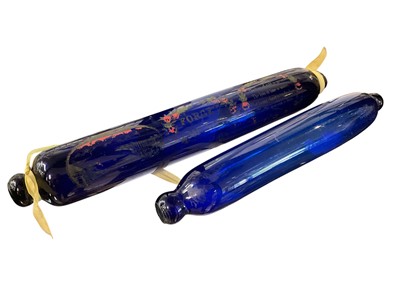 Lot 160 - Victorian blue glass rolling pin with motto, 43cm long, and another