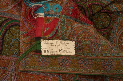 Lot 15 - The gift of H.M. Queen Victoria, fine Indian Kashmir shawl of intricate traditional design including with figures with sewn label ' Horatia E Erskine, June 26th 1861 ( Indian) from H.M.Queen Vict...
