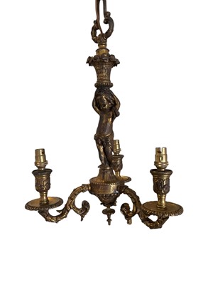 Lot 1590 - Gilt metal three light chandelier
