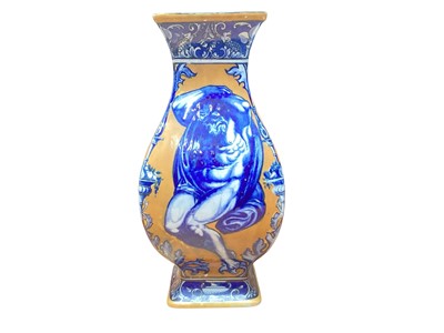 Lot 908 - Lucien Emile Boullemier (1877-1949) a pottery transfer printed and painted baluster vase in blue and ochre, signed and dated 1915, painted a male nude to each side within scrolls and fruiting ur...