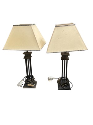 Lot 750 - Pair of contemporary bronzed metal table lamps with shades.