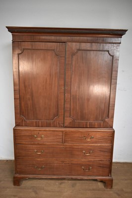 Lot 1546 - George III mahogany linen press