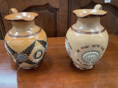 Lot 210 - Two Doulton jugs with interesting texts - one with "He that buys flesh, buys bones", the other "Bitter must be the cup that a smile will not sweeten"