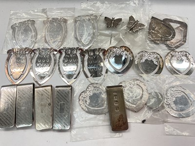 Lot 1092 - Silver money clip together with other plated money clips and bookmarks