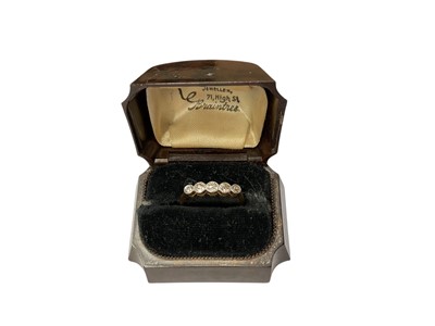 Lot 76 - Edwardian diamond five stone ring with five old cut diamonds in platinum millegrain setting on 18ct gold shank