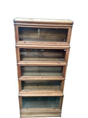 Lot 1238 - Early 20th century oak five tier Globe-Wernicke bookcase