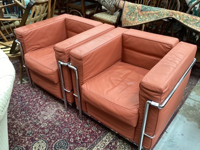 Lot 1447 - Pair of terracotta pink leather chairs