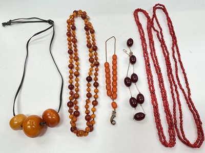 Lot 1032 - Amber and other similar bead necklaces