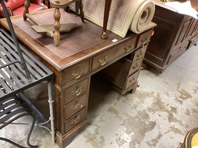 Lot 1361 - Unusual Georgian oak desk in two parts, the lift-off top with inset writing surface and slides to each side, having nine drawers about the cupboard kneehole on bracket feet, probably altered, 88...
