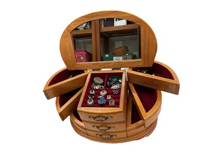 Lot 111 - Wooden jewellery box containing silver and white metal jewellery including gem set pendants and rings, earrings, green hard stone bead necklaces etc