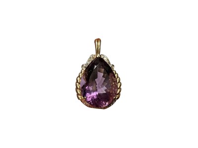 Lot 113 - Large amethsyt and diamond pear shaped pendant