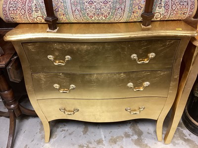Lot 1344 - Gilded bombé-shape chest of three drawers and a matching side table