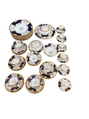 Lot 577 - Good quality Coalport tea service with floral garlands on blue and gilt ground, 61 pieces