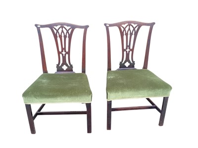 Lot 1371 - Pair of George III mahogany dining chairs with pierced shaped splats and green velvet upholstered seats
