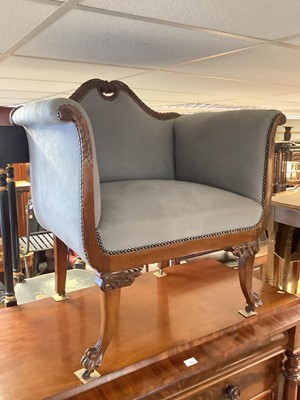 Lot 1307 - Antique Continental mahogany framed twin scroll armchair with carved gadrooned top rail above suede upholstery, on splayed legs and carved feet terminating on castors