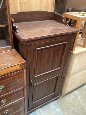 Lot 1223 - Stained pine cupboard with shelved interior enclosed by panelled door, 70cm wide, 48cm deep, 136cm high