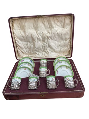 Lot 245 - Fitted case of Edwardian silver mounted coffee cans and saucers