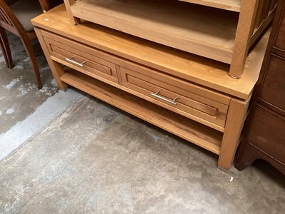 Lot 1244 - Light oak coffee table with two drawers and undertier, 120cm x 60cm x 50cm high together with another table