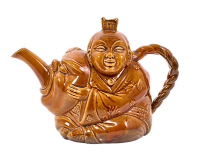 Lot 282 - Minton brown glazed teapot and cover, in the form of a chinaman