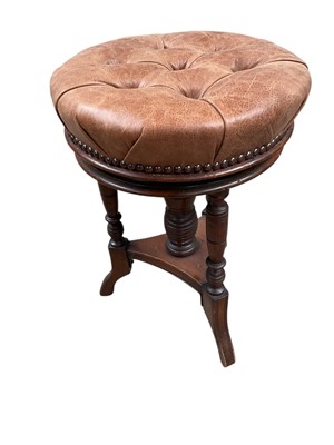 Lot 1348 - Victorian piano stool with leather top