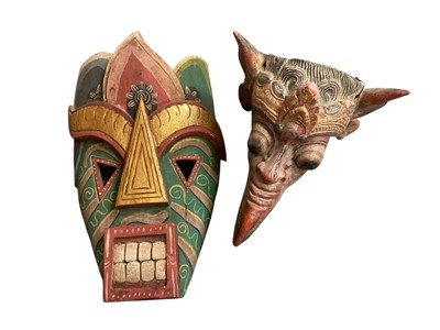 Lot 227 - Thai polychrome painted carved wooden mask and another mask