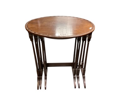 Lot 1359 - RAF interest- nest of three 1920's mahogany oval occasional tables, with stamped 'AM' Air Ministry marks to undersides.
