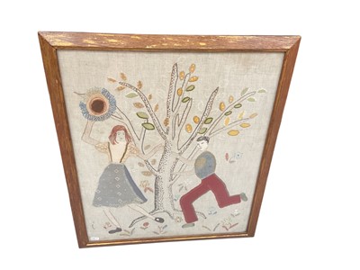 Lot 425 - 20th century English naïve embroidery of figures by a tree, in glazed frame.