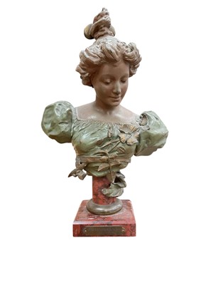 Lot 37 - Antique Art Nouveau patinated spelter bust of a woman on a red marble base, 28.5cm high