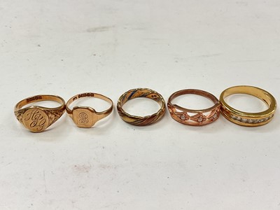 Lot 1086 - Two 9ct gold signet rings, 9ct wedding band, 9ct rose gold seed pearl ring and one other yellow metal ring set with synthetic white stones (5)