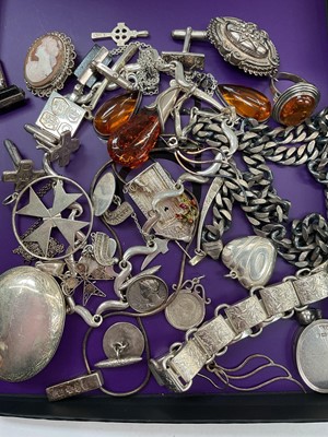 Lot 1082 - Group of silver and white metal jewellery including amber pendant, pair of earrings and a ring, various chains, lockets, cufflinks etc