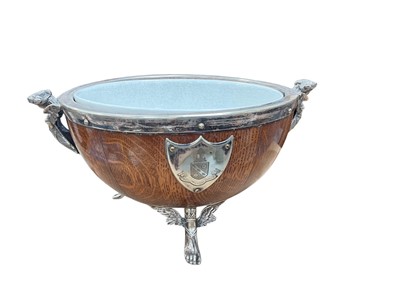 Lot 494 - Early 20th century golden oak fruit bowl with ceramic liner and silver plated mounts.