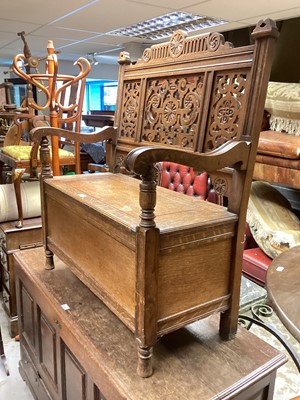 Lot 1358 - Carved oak hall bench with rising lid to seat, 91cm wide, 45.5cm deep, 107cm high