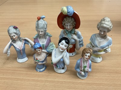 Lot 279 - Collection of eight early 20th century continental porcelain half-dolls/pin cushions (8)
