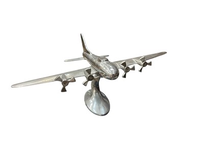 Lot 772 - Metal model of a plane measuring approximately 25cm high
