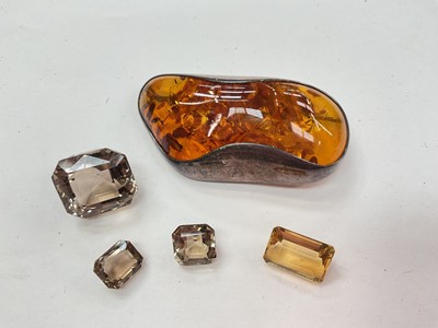 Lot 1163 - Three unmounted smokey quartz, ditto citrine, amber brooch and loose cultured pearls