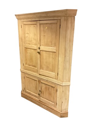 Lot 1378 - Antique pine corner cupboard with shaped shelves enclosed by four panelled doors, 140cm wide, 192.5cm high