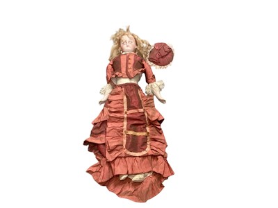 Lot 887 - Bisque head doll with kid leather body, lace trimmed clothing