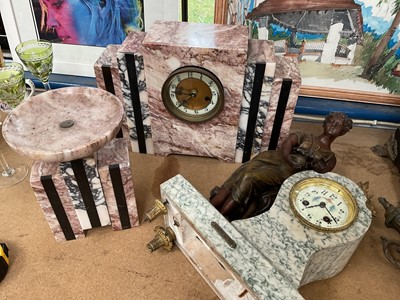 Lot 91 - Large Art Deco marble stepped mantel clock with matching ornament, together with a French spelter figural clock with matching vase (4)