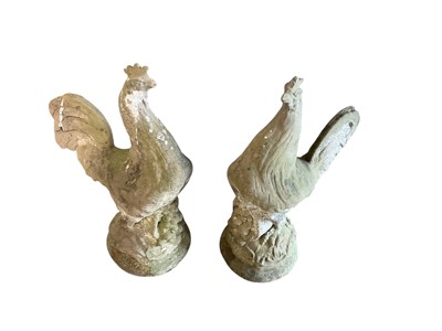 Lot 1398 - Pair of concrete cockerels. 67cm tall by 42cm wide.