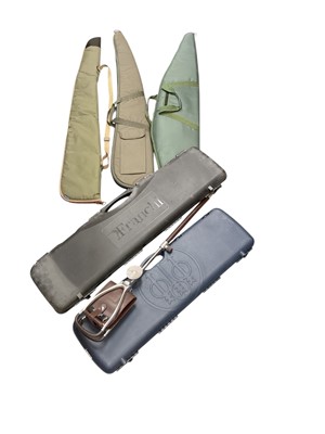 Lot 548 - Three gun slip cases, two hard cases and a shooting stick.