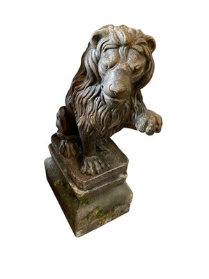Lot 1405 - Concrete lion sculpture on plinth. Approximately 86cm tall by 30cm wide by 47 deep.