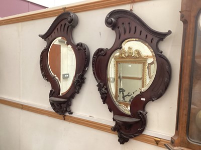 Lot 1428 - Two Edwardian mahogany framed bevelled wall mirrors, 54cm x 89cm