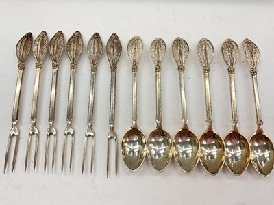 Lot 1135 - Set of twelve continental silver (800) spoons and two-pronged forks, possibly for eating snails