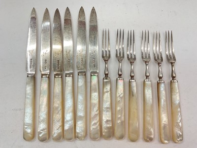 Lot 1136 - Set of twelve Victorian silver and mother of pearl handled cake knives and forks