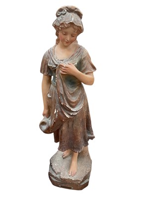 Lot 567 - Painted plaster figure of a female water carrier, 59cm in height.
