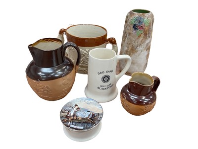 Lot 740 - Group of ceramics to include salt glazed stoneware loving cup, Royal Doulton stoneware vase, another two Doulton jugs and a Royal Doulton St John’s Ambulance 1938 Blackpool mug...