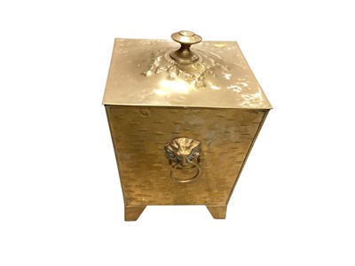 Lot 1453 - Victorian embossed brass coal bin with brass lions head ring handles