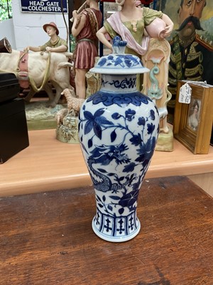 Lot 127 - 19th century Chinese blue and white porcelain vase and cover, painted with dragons and flowers, 27cm high